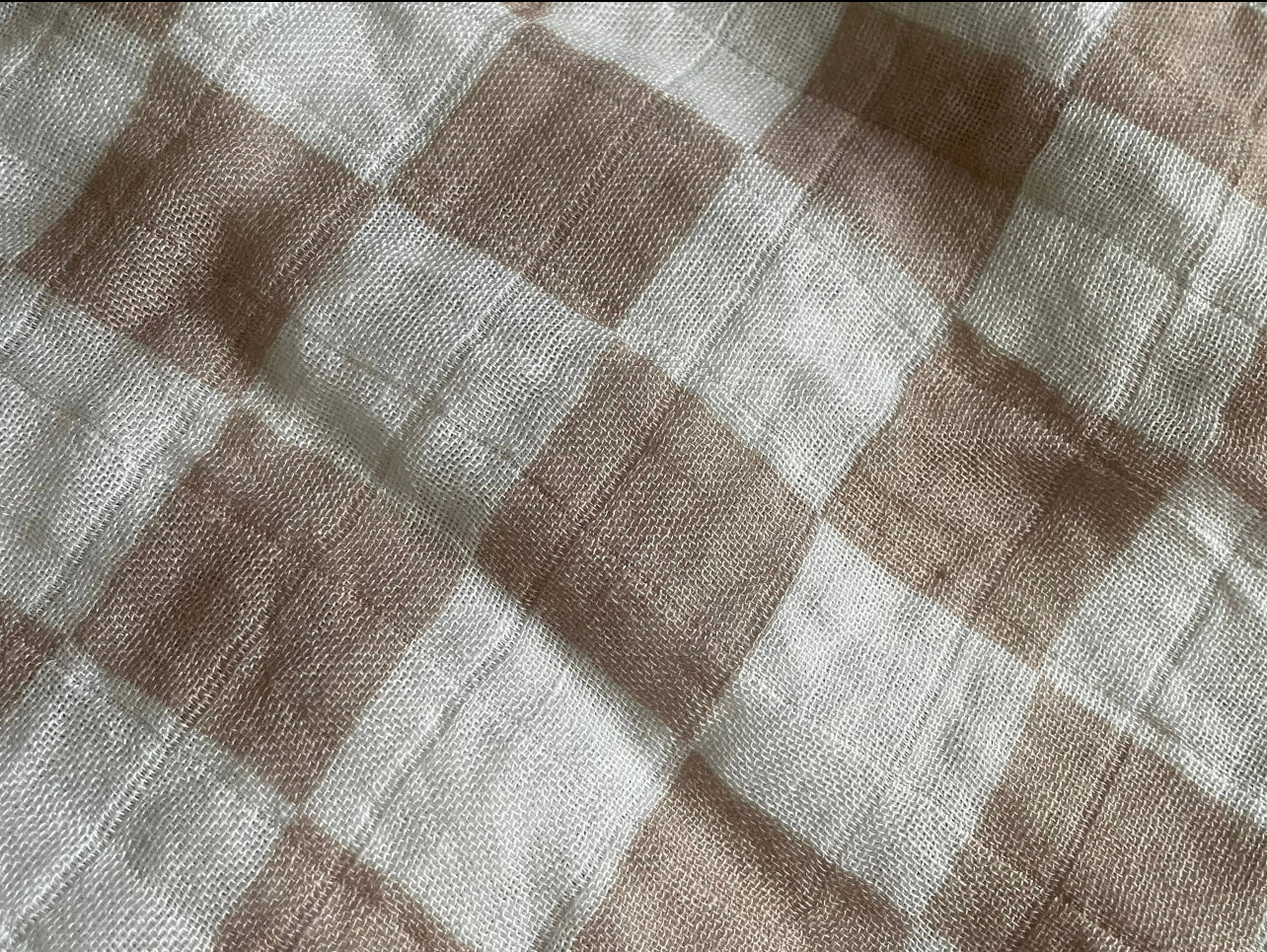 Checkered print muslin swaddle